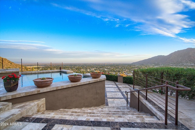 view of patio with a mountain view