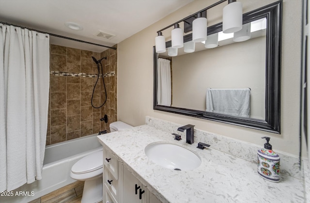 8141 N Central Ave Unit 9, Phoenix, AZ 85020 - bathroom featuring toilet, vanity, and shower / tub combo with curtain