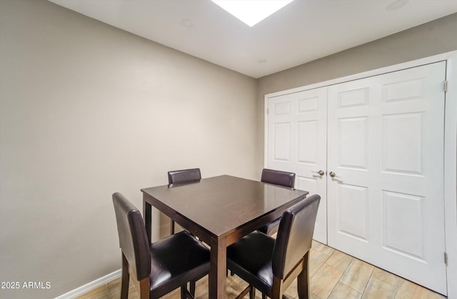 8141 N Central Ave Unit 9, Phoenix, AZ 85020 - dining space featuring light wood-style floors and baseboards