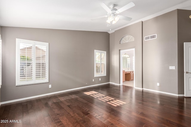 2230 E Whitten St, Chandler, AZ 85225 - unfurnished bedroom featuring vaulted ceiling, wood finished floors, and connected bathroom
