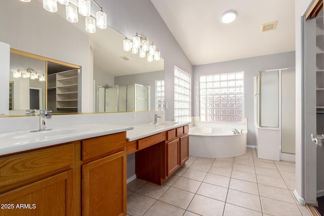 2230 E Whitten St, Chandler, AZ 85225 - full bathroom featuring a stall shower, vaulted ceiling, double vanity, a bath, and tile patterned floors