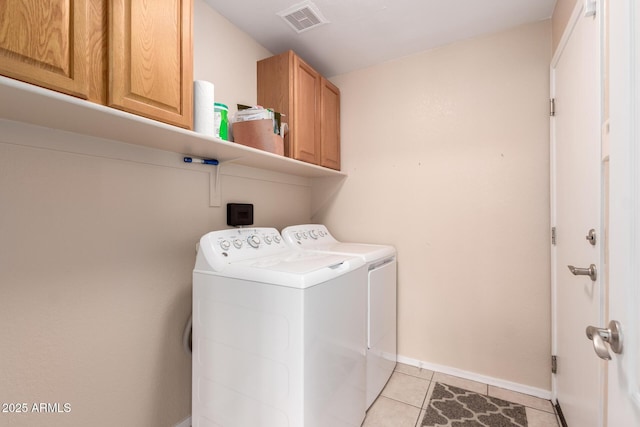 2230 E Whitten St, Chandler, AZ 85225 - laundry room with cabinet space, washer and dryer, and light tile patterned floors