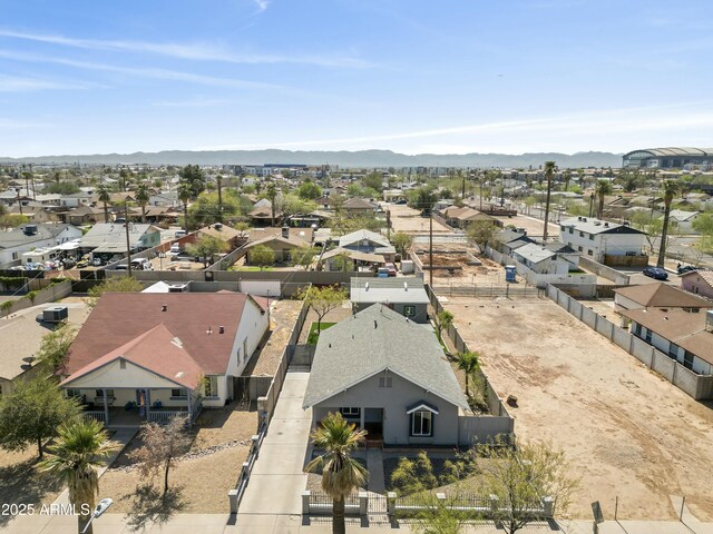 aerial view with a mountain view and a residential view