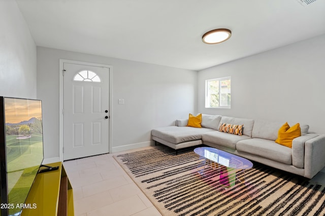 living room featuring baseboards