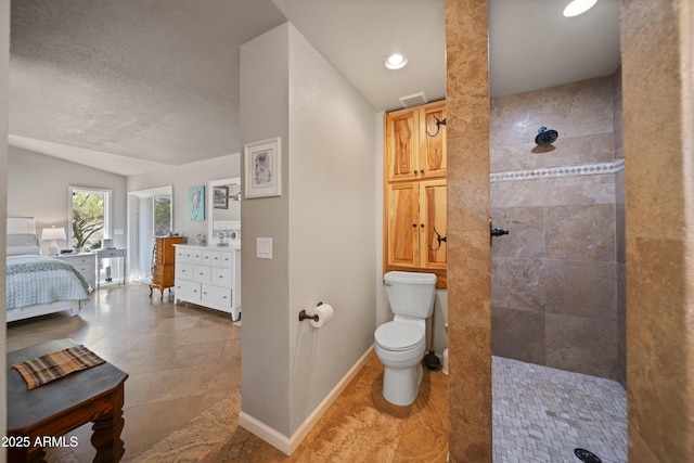 1185 S Camino Cobre Dr, Wickenburg, AZ 85390 - ensuite bathroom featuring ensuite bathroom, visible vents, a walk in shower, tile patterned flooring, and vaulted ceiling