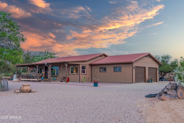 1185 S Camino Cobre Dr, Wickenburg, AZ 85390 - view of front of property featuring a porch and a garage