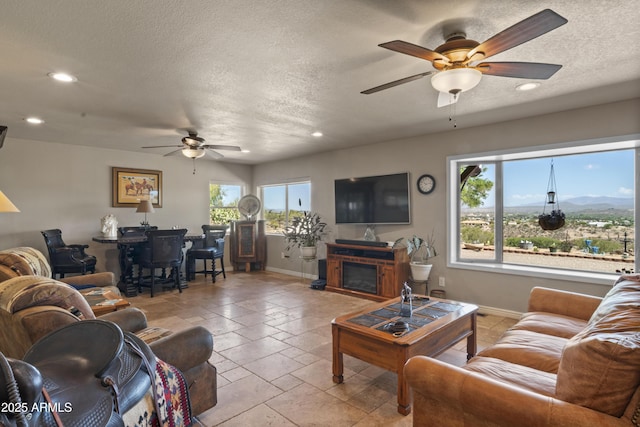 1185 S Camino Cobre Dr, Wickenburg, AZ 85390 - living room featuring baseboards, a ceiling fan, and recessed lighting