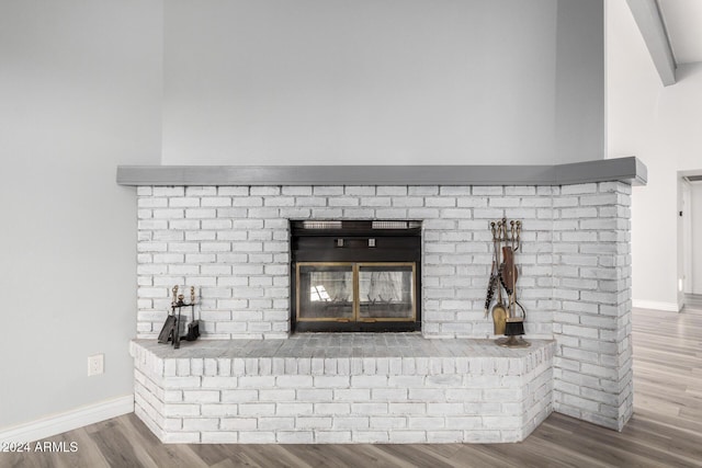 3315 E Hampton Ave, Mesa, AZ 85204 - detailed view of wood finished floors and a brick fireplace