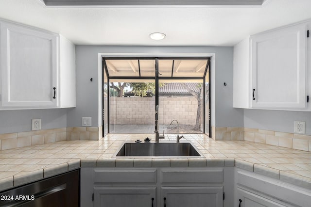 3315 E Hampton Ave, Mesa, AZ 85204 - kitchen featuring dishwasher, white cabinets, and tile counters