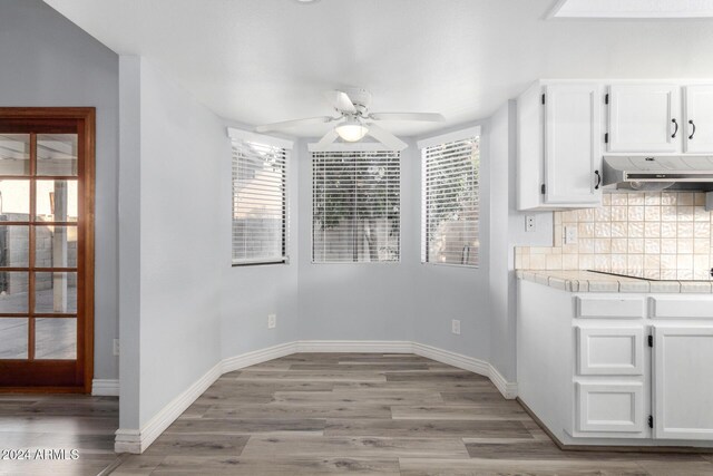 3315 E Hampton Ave, Mesa, AZ 85204 - unfurnished dining area featuring a ceiling fan and light wood finished floors