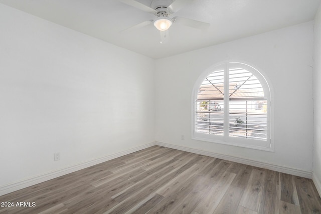 3315 E Hampton Ave, Mesa, AZ 85204 - unfurnished room with wood finished floors and a ceiling fan