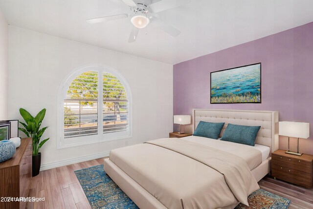 3315 E Hampton Ave, Mesa, AZ 85204 - bedroom with wood finished floors and a ceiling fan