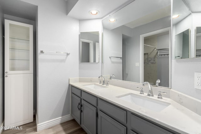 3315 E Hampton Ave, Mesa, AZ 85204 - bathroom featuring double vanity and wood finished floors