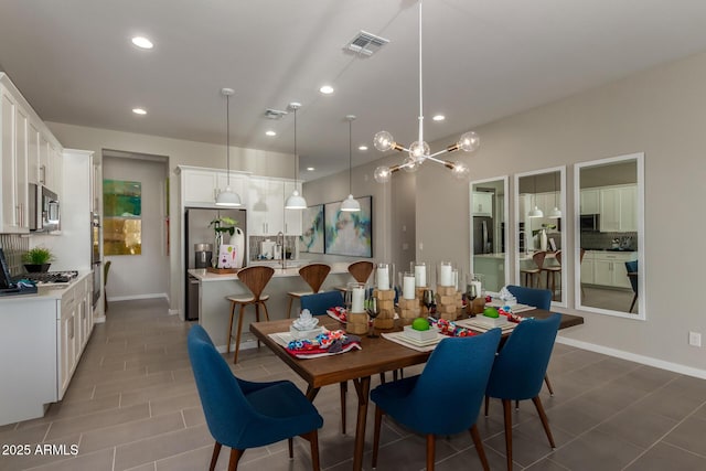 27647 N 176th Dr, Surprise, AZ 85387 - dining room featuring a chandelier, recessed lighting, baseboards, and tile patterned flooring