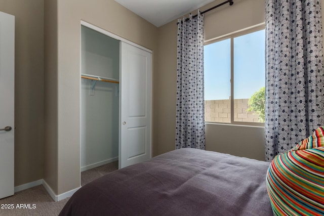 27647 N 176th Dr, Surprise, AZ 85387 - carpeted bedroom with baseboards and a closet