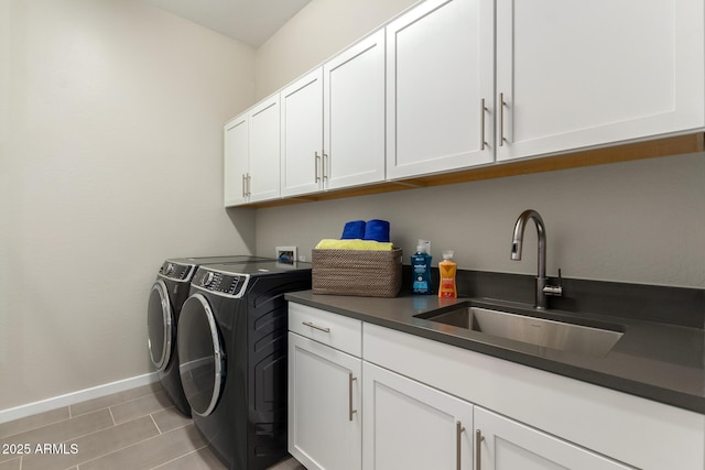 27647 N 176th Dr, Surprise, AZ 85387 - laundry area with cabinet space, independent washer and dryer, baseboards, and light tile patterned floors
