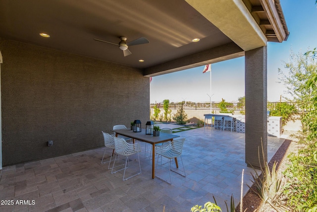 27647 N 176th Dr, Surprise, AZ 85387 - fenced backyard with outdoor dining area, a patio, and a ceiling fan