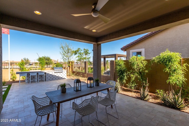 27647 N 176th Dr, Surprise, AZ 85387 - fenced backyard featuring a patio area, a ceiling fan, and outdoor dining space