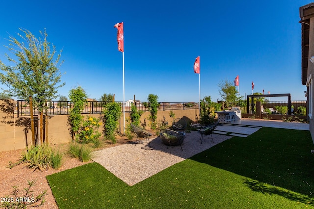 27647 N 176th Dr, Surprise, AZ 85387 - view of yard with a patio area