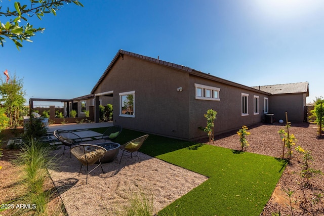 27647 N 176th Dr, Surprise, AZ 85387 - rear view of house with central AC, a patio area, stucco siding, and a tiled roof