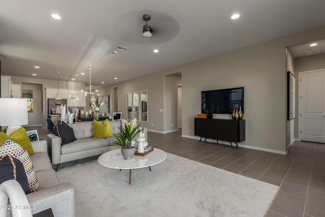 27647 N 176th Dr, Surprise, AZ 85387 - tiled living area featuring a ceiling fan, recessed lighting, and baseboards