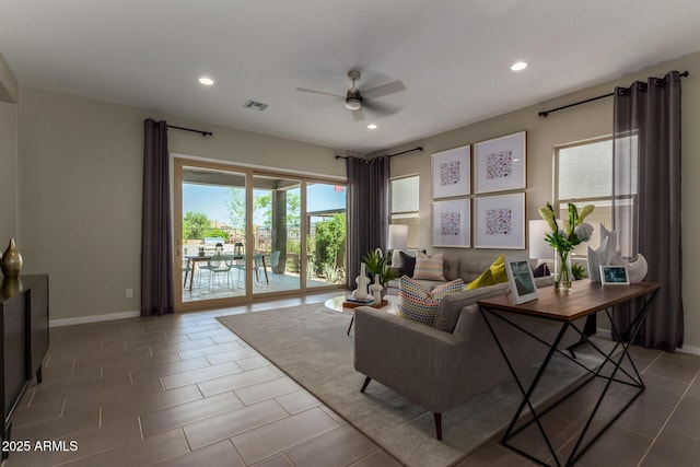 27647 N 176th Dr, Surprise, AZ 85387 - living room featuring ceiling fan, recessed lighting, tile patterned floors, and baseboards