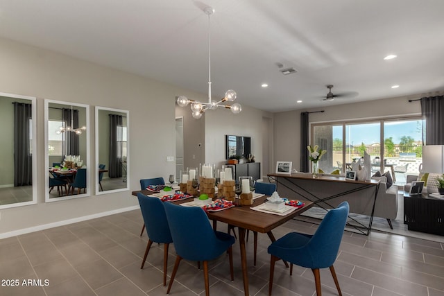 27647 N 176th Dr, Surprise, AZ 85387 - dining room featuring a chandelier, recessed lighting, baseboards, and ceiling fan