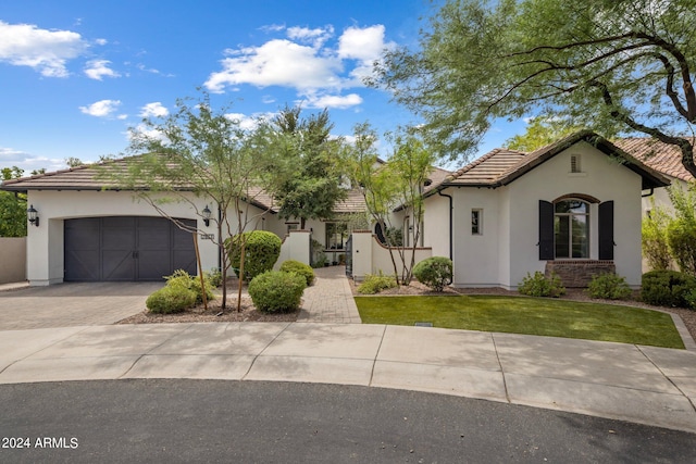 view of front of property featuring a garage