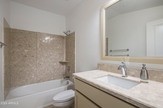 full bathroom with lofted ceiling, vanity, toilet, and tiled shower / bath combo