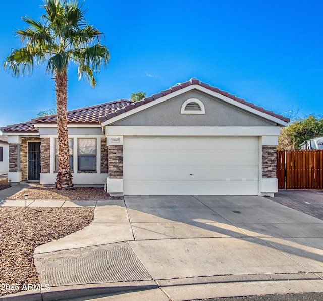 single story home featuring a garage