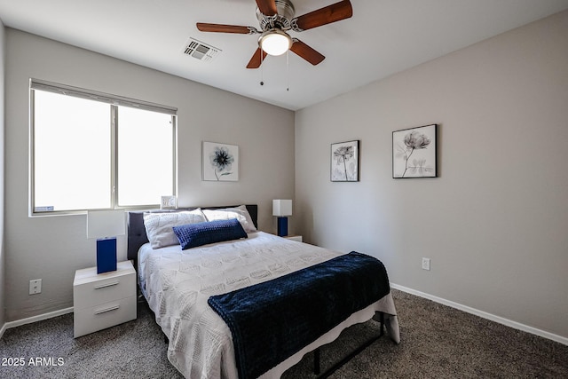 bedroom with dark carpet and ceiling fan