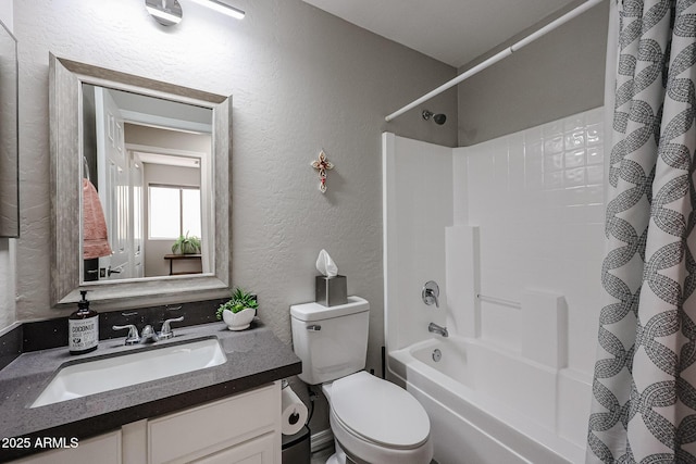 full bathroom featuring vanity, toilet, and shower / bath combo with shower curtain