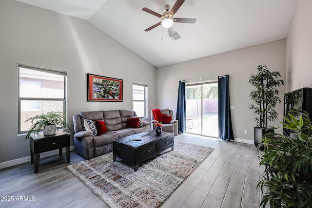 living room with vaulted ceiling and ceiling fan