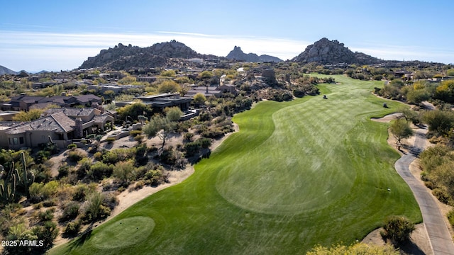 birds eye view of property featuring a mountain view