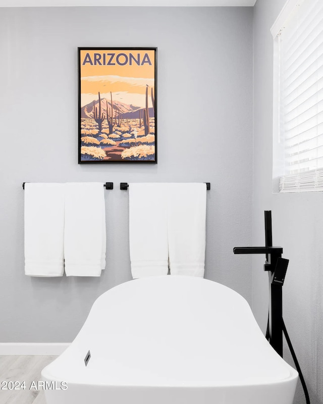 bathroom with a washtub