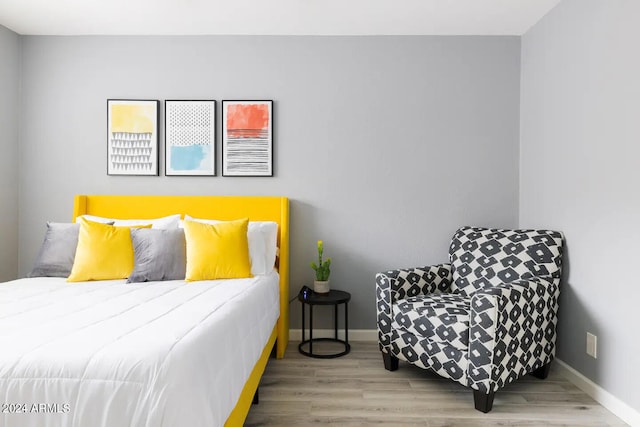 bedroom featuring hardwood / wood-style flooring