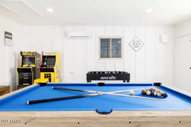 playroom featuring a wall unit AC and pool table