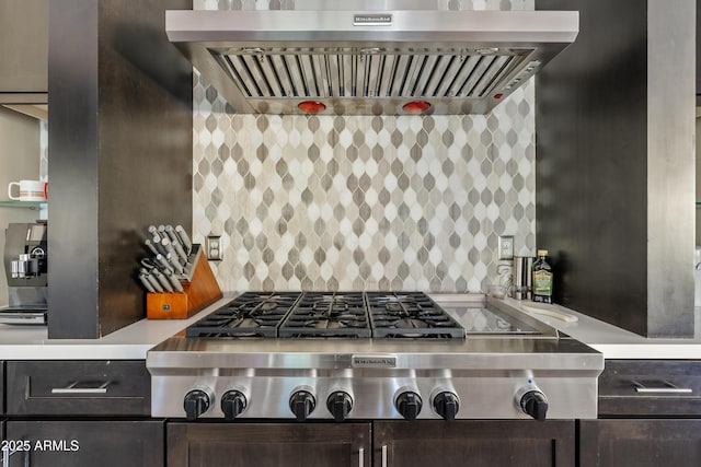 5420 E Duane Ln, Cave Creek, AZ 85331 - kitchen with stainless steel gas cooktop, range hood, light countertops, and tasteful backsplash