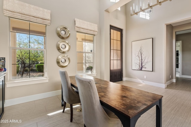 5420 E Duane Ln, Cave Creek, AZ 85331 - dining space featuring baseboards and a towering ceiling