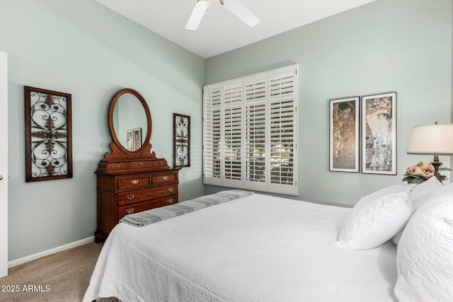 bedroom featuring carpet floors, a ceiling fan, and baseboards