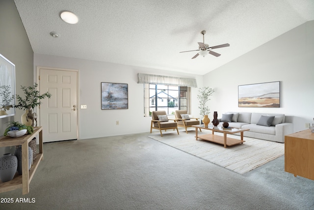 carpeted living room with ceiling fan, lofted ceiling, and a textured ceiling