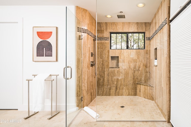 bathroom with an enclosed shower