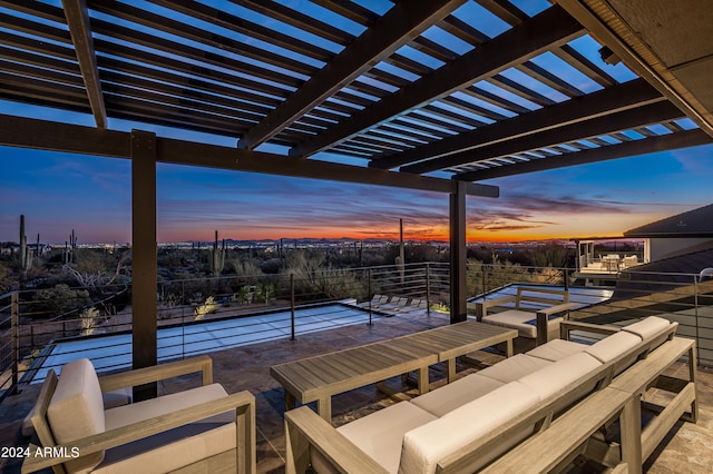 patio terrace at dusk with a pergola