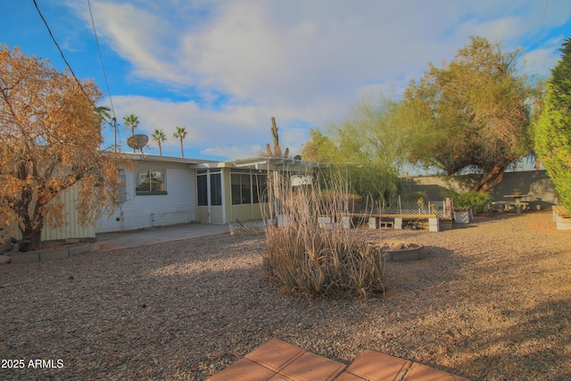 back of house with a patio