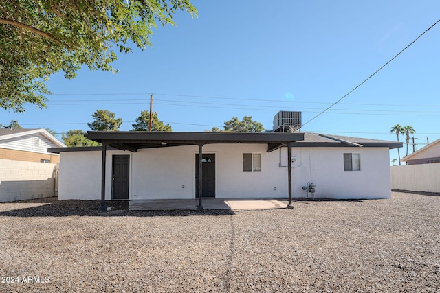 back of property featuring a patio area and central AC unit