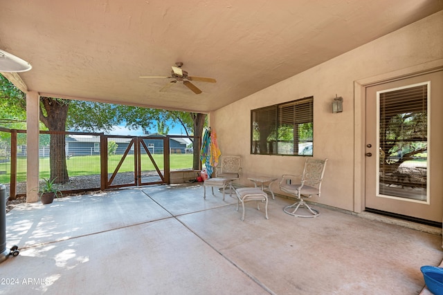 view of patio / terrace featuring ceiling fan