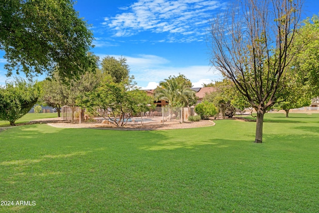 surrounding community featuring a lawn