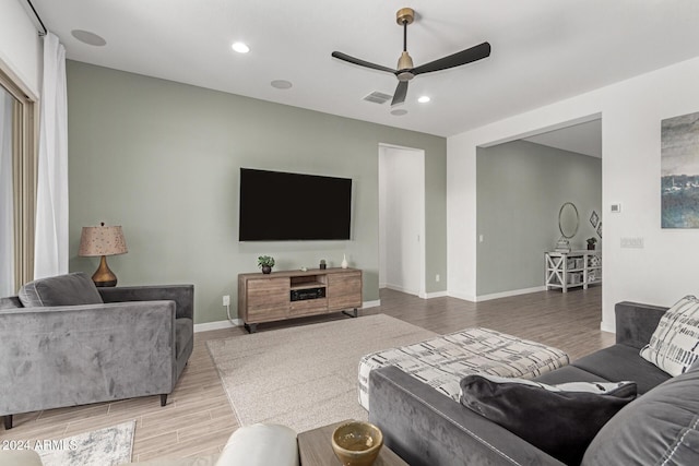 living room with ceiling fan