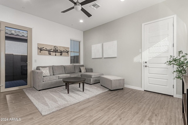 living room with ceiling fan