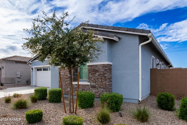 view of front of home with a garage